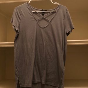 criss-crossed v-neck shirt